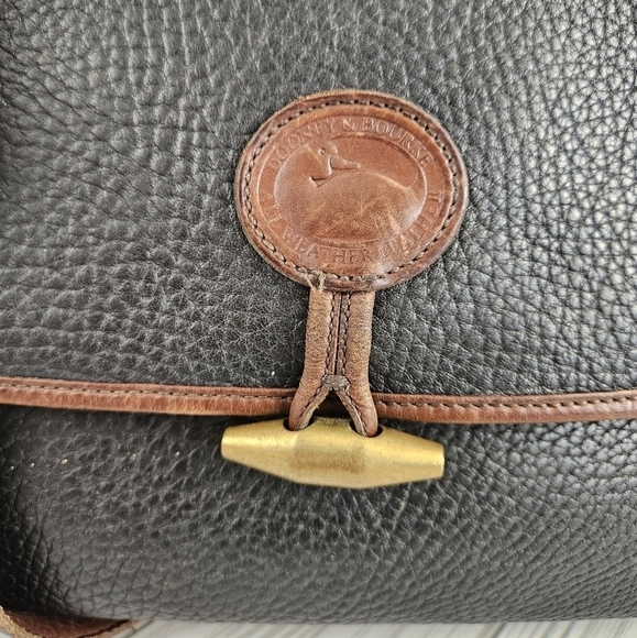 Dooney & Bourke Vintage All Weather Leather Toggle Satchel Saddle Bag in Black - Picture 3 of 17